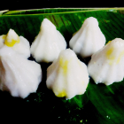 Modak (Rice dumpling stuffed with coconut and jaggery)