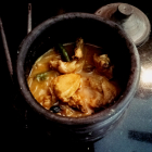 Cooking chicken in a clay pot