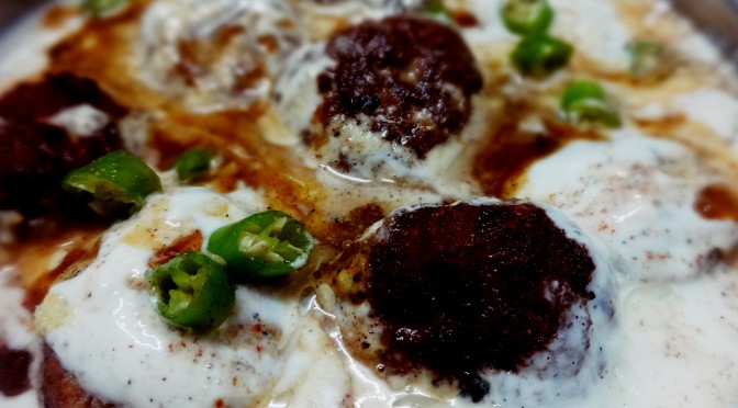 keema dahi vada(chicken dumpling soaked in yoghurt sauce)