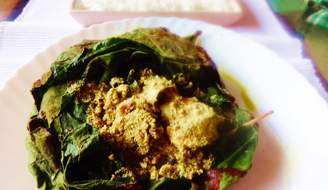 chingrir paturi(Prawns cooked wrapped in pumpkin leaves)