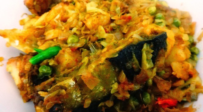 Machher matha badhakopi(Cabbage with fish head)