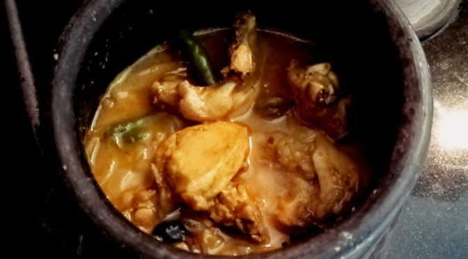 Cooking chicken in a clay pot