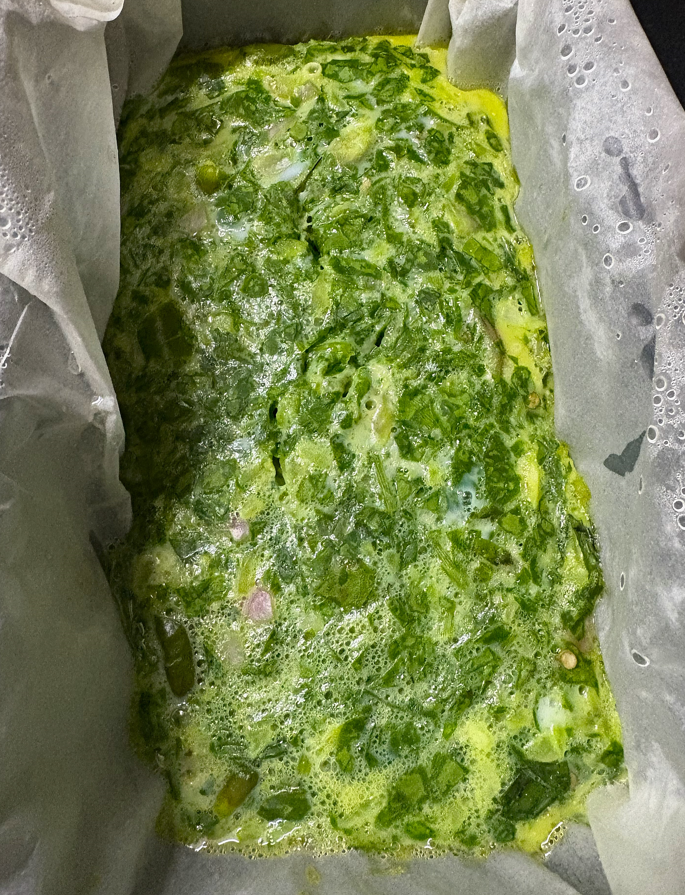 Egg and spinach mixture getting steamed