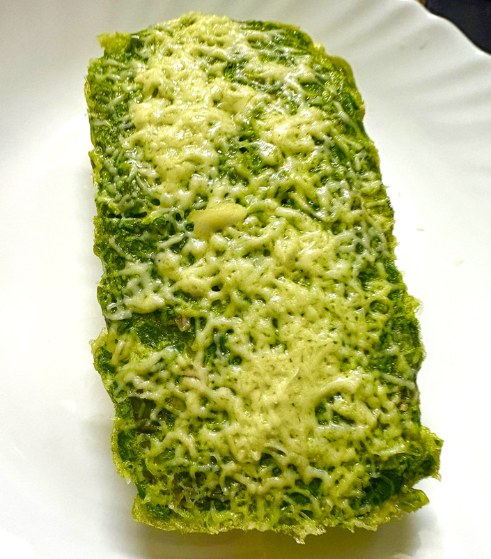 Egg mixture topped with grated mozzarella